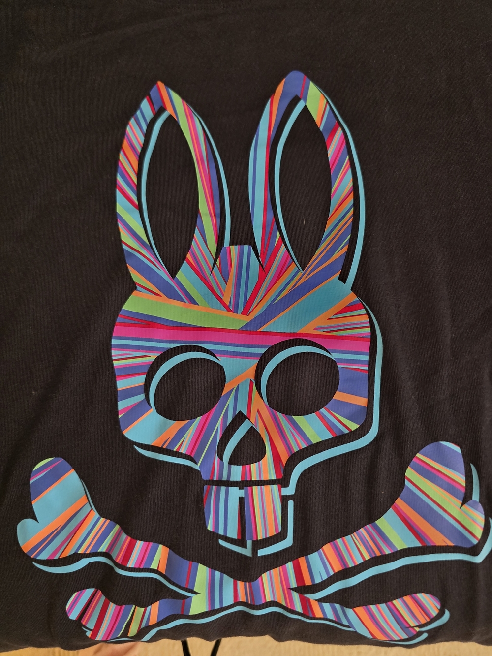 Psycho Bunny Black Tee with Multicolor Striped Bunny Skull